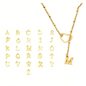 Golden stainless steel necklace with hollow heart and initial charm, A-Z letter options