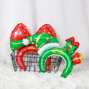 Christmas headband foil balloons with Merry Christmas print in red and green festive colors