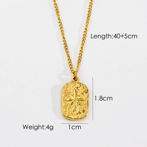 Detailed view of vintage gold rectangular pendant with starburst texture and size info