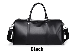 Detail of black pebbled leather travel bag featuring reinforced metal hardware and dual handles