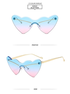 Detail view of rimless heart-shaped sunglasses with gold temples and blue pink lenses