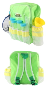 Detail view of science experiment kit including green backpack, test tubes, and goggles