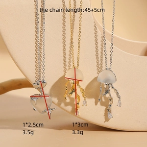 Minimalist jellyfish and heart pendants in 14K gold plated copper with moonstone