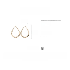 Detail view of twisted drop earrings showing 4.5cm height and 3.5cm width dimensions