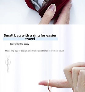 Detail of red velvet mini makeup bag with durable golden metal ring zipper closure