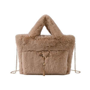 Women's faux rabbit fur tote bag in light camel with golden reindeer charm and chain