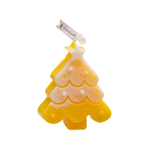 Christmas tree scented candle with star topper in white and yellow layers on white background