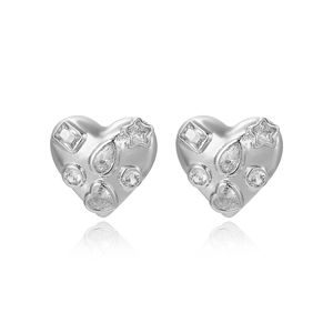 Detail of silver heart earrings with multi-shaped zircon stone inlay and 18k plating