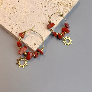 Bohemian gold plated hoop earrings with red natural stones and sun pendants