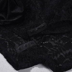 Close-up of three-snap button closure on black lace and satin bodysuit with intricate details