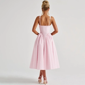 Detail view of pink plaid backless midi dress showing secure tie-up straps and waist design