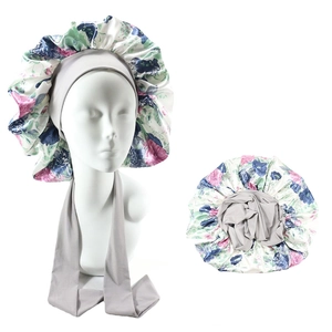 Floral satin sleep bonnet with wide grey elastic strap and retro flower pattern