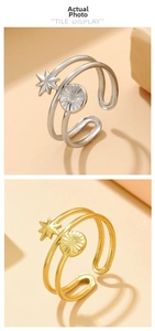 Detail view of adjustable stainless steel rings in gold and silver with starburst textures