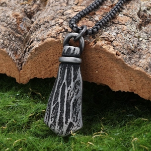 Retro Viking style titanium steel pendant with rugged wood grain texture on a box chain