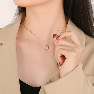 Minimalist gold titanium steel necklace with sparkling round cubic zirconia pendant