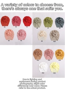 Flat lay collection of 15 colorful baby turban hats with rose knot design details