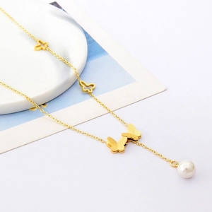 Elegant gold titanium steel necklace featuring butterfly charms and a lustrous white pearl