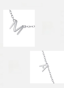 Vue macro du pendentif Mama en argent sterling 925 et détails de la chaîne polie