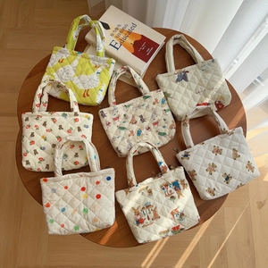 Quilted cotton handheld phone bags in seven assorted cute animal and floral patterns