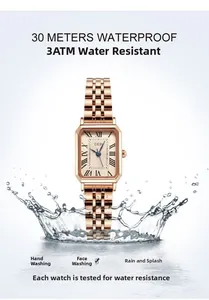 Detail of waterproof rose gold rectangular women watch with water splash effect