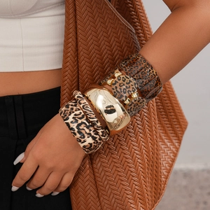 Five-piece leopard print acrylic and gold-tone metal bracelet set for women