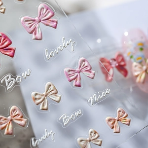 3D embossed bow nail art stickers with butterfly and letter patterns for manicure