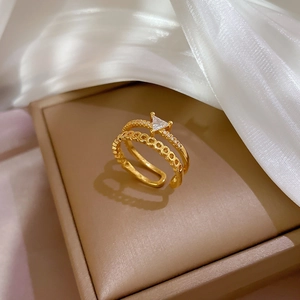 Elegant gold double-layer open ring featuring a sparkling triangle zircon on silk