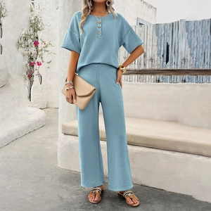 Women's 2-piece knit set with short sleeve top and wide leg pants in light blue color