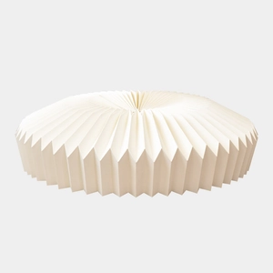 Minimalist white pleated Christmas tree skirt with elegant Nordic style accordion texture
