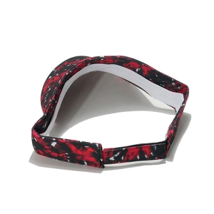 Detail view of the adjustable back strap and tie-dye floral pattern on the sun visor hat