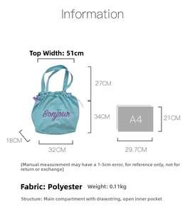 Detail view of lightweight nylon tote bag with drawstring closure and Bonjour print