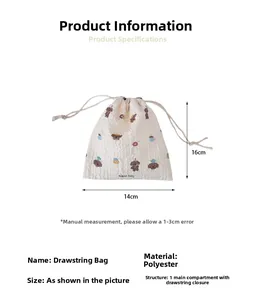 Detail view of Bread Dog drawstring pouch with cartoon prints and 14x16cm dimensions