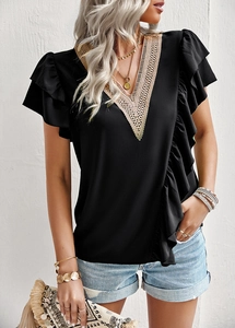 Detail of V-neck short sleeve blouse featuring gold lace trim and elegant ruffled sleeves