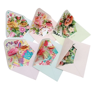 Set of 3D pop-up greeting cards with colorful floral, cat and unicorn designs in envelopes