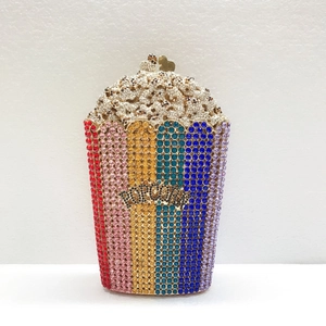 Macro shot of colorful rhinestone popcorn-shaped evening clutch bag with crystal details