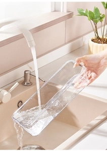 Water rinsing a large-capacity clear noodle storage box with easy-to-clean wide mouth