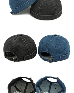 Dettaglio del cappello docker in denim con fibbia in metallo vintage ed etichetta