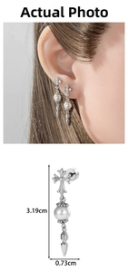 Detail showing pearl cross earring dimensions 3.19cm length and 0.73cm width