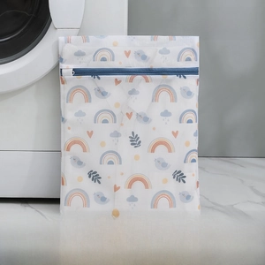 Close-up of a large 50x60cm fine mesh laundry bag with cute bird and rainbow prints