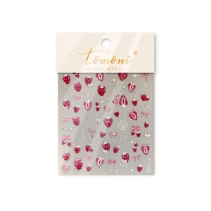 DIY sweet strawberry and heart nail art stickers in pink and red tones on white background