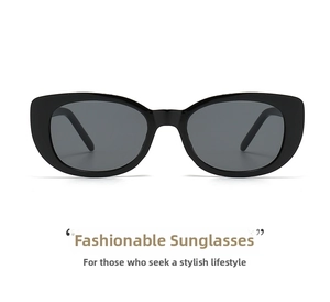 Detail of vintage cat-eye sunglasses with thick black frames and dark UV lenses