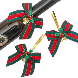 Christmas bow decorations with red and green stripes, small bells, and ties for trees