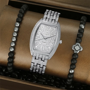 Luxurious silver tonneau quartz watch and beaded bracelet set with sparkling diamonds