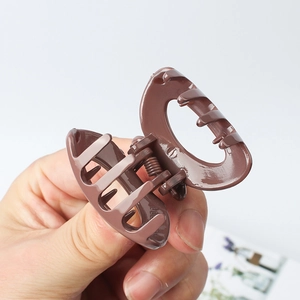 Minimalist matte brown hollow semicircular hair claw clip for high ponytail styling