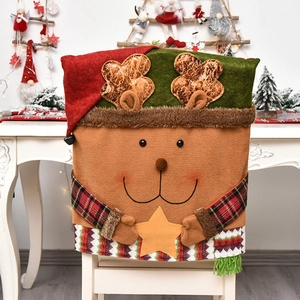 Christmas reindeer chair cover in festive red and green on a white chair background
