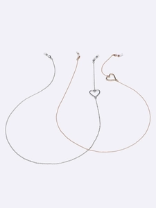 Three-piece glasses chain set featuring heart pendants in silver and rose gold finishes