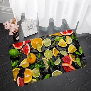Rectangle flannel mat with vibrant citrus fruit pattern on a grey wooden floor