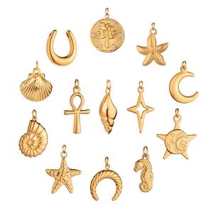 13-piece set of gold-plated stainless steel charms featuring sea and celestial motifs