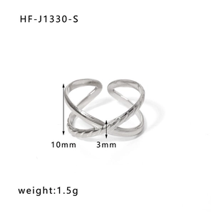 Detail view of crossover stainless steel ring with 10mm height and twisted texture