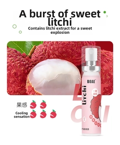 Close-up of 20ml lychee breath spray with fresh fruit background and cool sensation